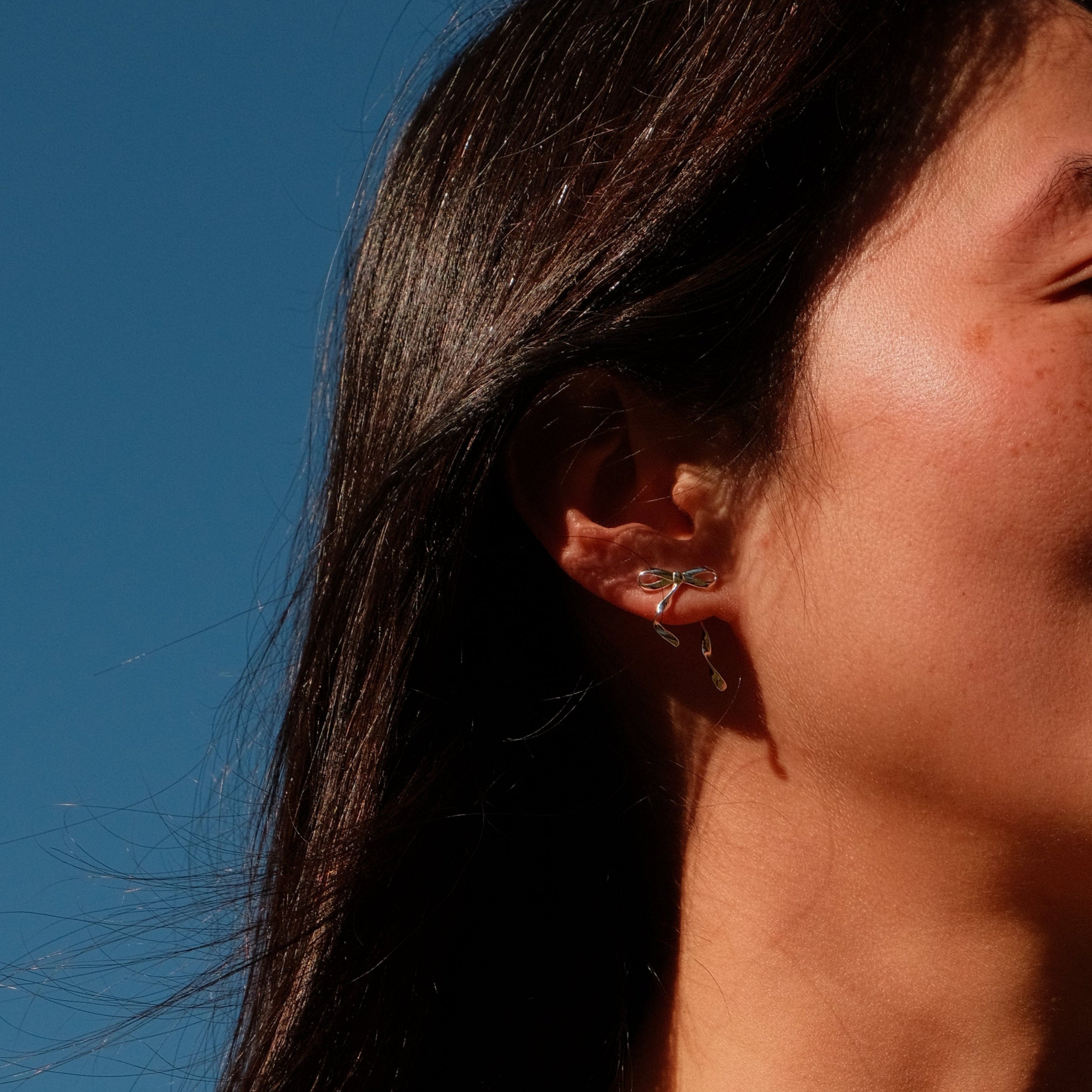 Tied Apart - Twisted Sterling Silver Bow Earrings